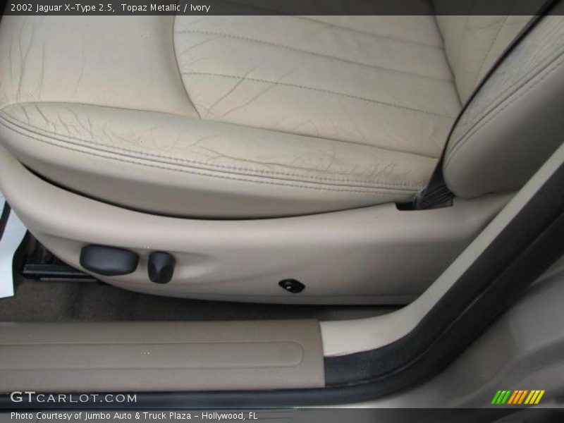 Topaz Metallic / Ivory 2002 Jaguar X-Type 2.5