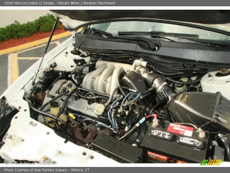 Vibrant White / Medium Parchment 2000 Mercury Sable LS Sedan