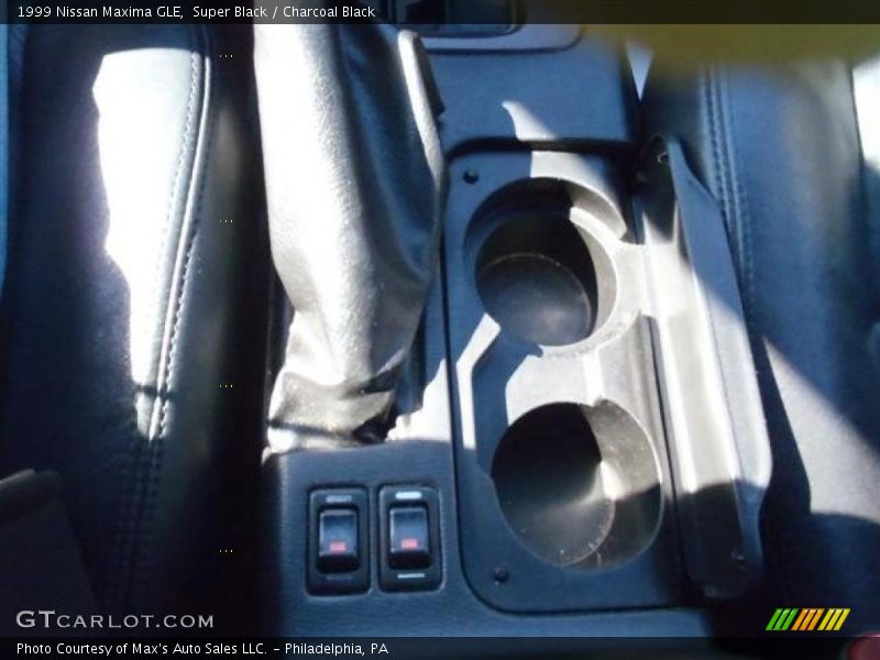 Super Black / Charcoal Black 1999 Nissan Maxima GLE