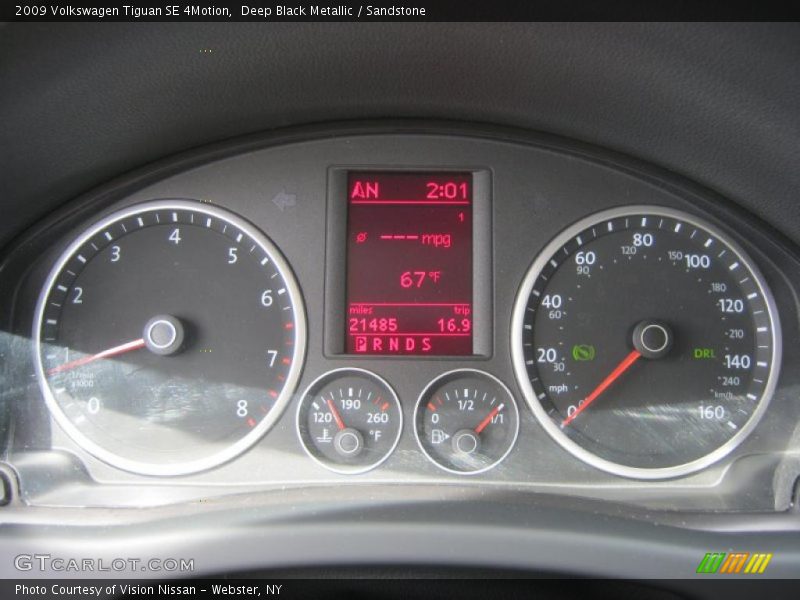 Deep Black Metallic / Sandstone 2009 Volkswagen Tiguan SE 4Motion