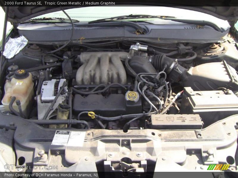Tropic Green Metallic / Medium Graphite 2000 Ford Taurus SE