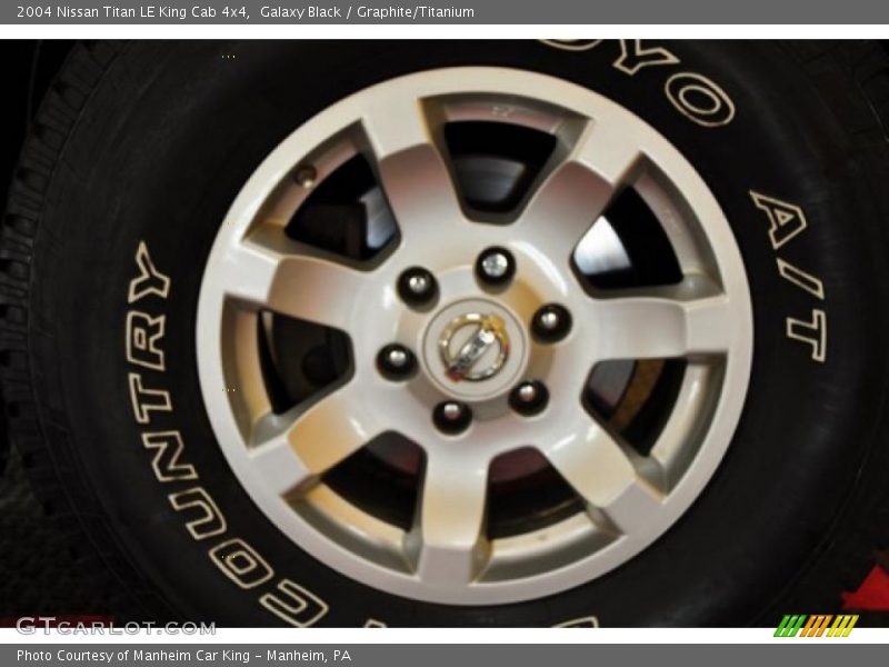 Galaxy Black / Graphite/Titanium 2004 Nissan Titan LE King Cab 4x4
