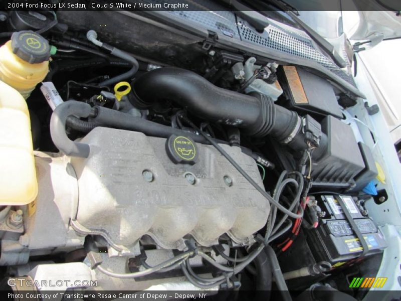 Cloud 9 White / Medium Graphite 2004 Ford Focus LX Sedan