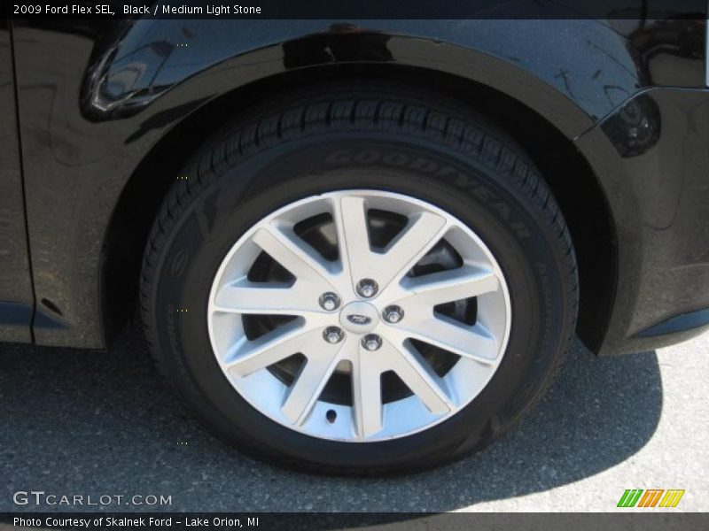 Black / Medium Light Stone 2009 Ford Flex SEL