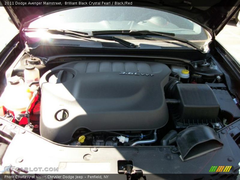Brilliant Black Crystal Pearl / Black/Red 2011 Dodge Avenger Mainstreet