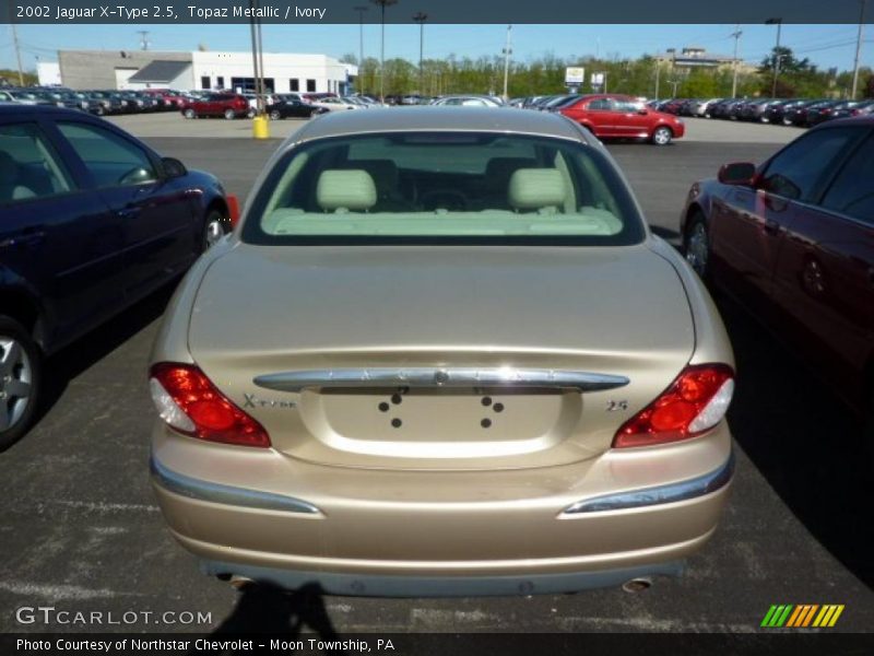 Topaz Metallic / Ivory 2002 Jaguar X-Type 2.5