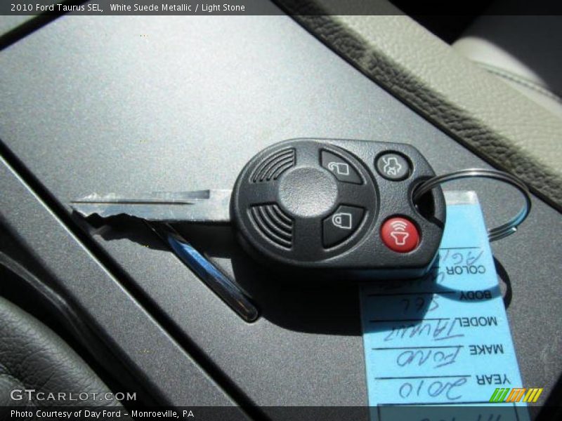 White Suede Metallic / Light Stone 2010 Ford Taurus SEL