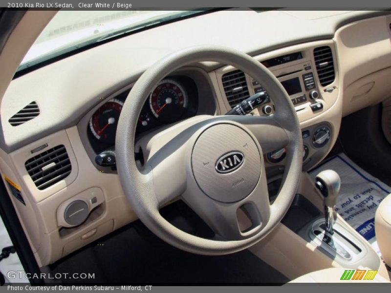 Clear White / Beige 2010 Kia Rio LX Sedan