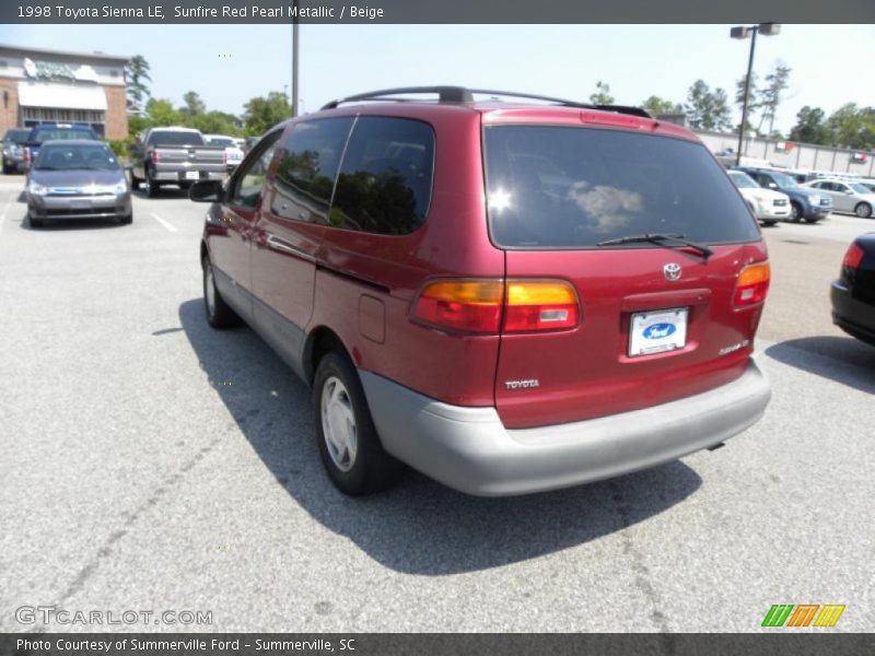 Sunfire Red Pearl Metallic / Beige 1998 Toyota Sienna LE