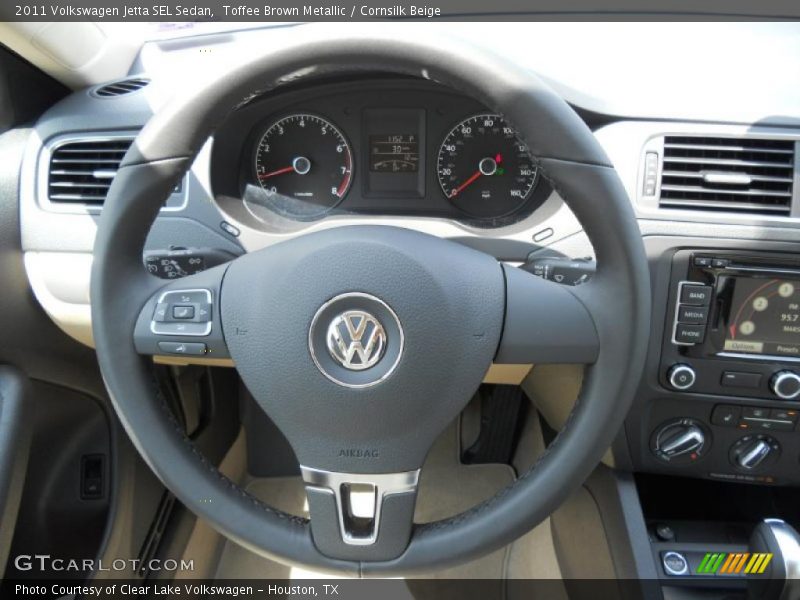 Toffee Brown Metallic / Cornsilk Beige 2011 Volkswagen Jetta SEL Sedan