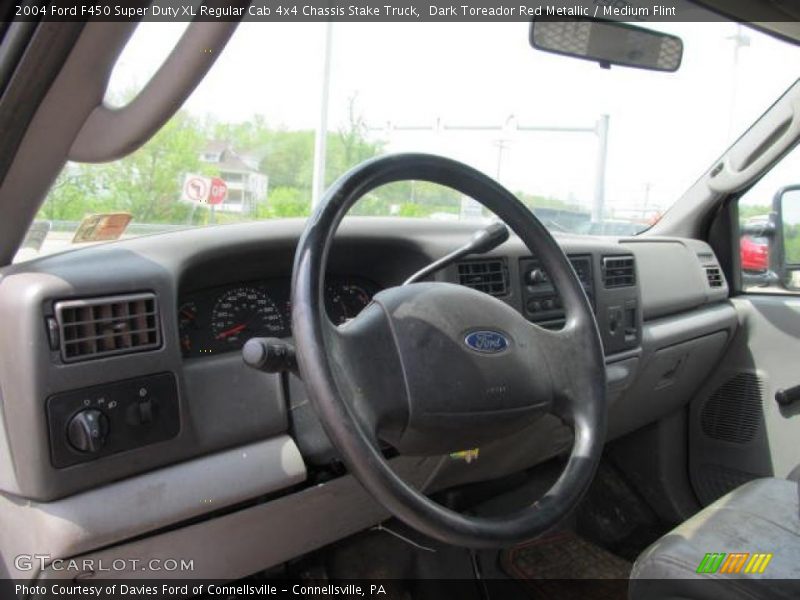 Dark Toreador Red Metallic / Medium Flint 2004 Ford F450 Super Duty XL Regular Cab 4x4 Chassis Stake Truck