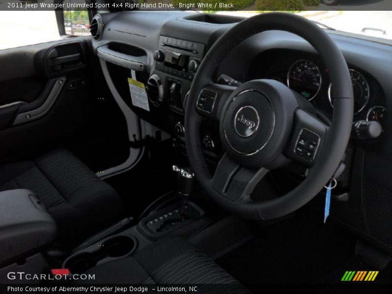 Bright White / Black 2011 Jeep Wrangler Unlimited Sport 4x4 Right Hand Drive