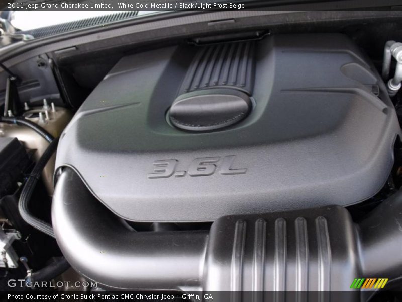 White Gold Metallic / Black/Light Frost Beige 2011 Jeep Grand Cherokee Limited