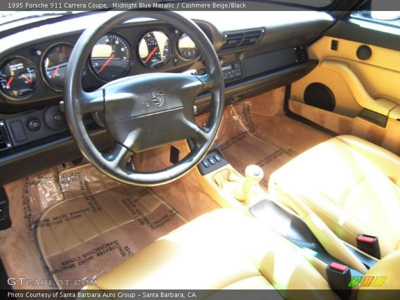Midnight Blue Metallic / Cashmere Beige/Black 1995 Porsche 911 Carrera Coupe