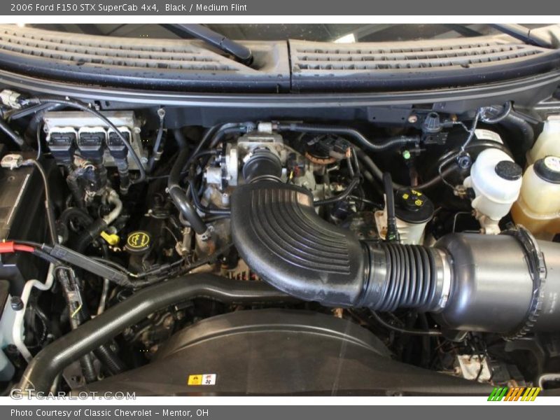 Black / Medium Flint 2006 Ford F150 STX SuperCab 4x4