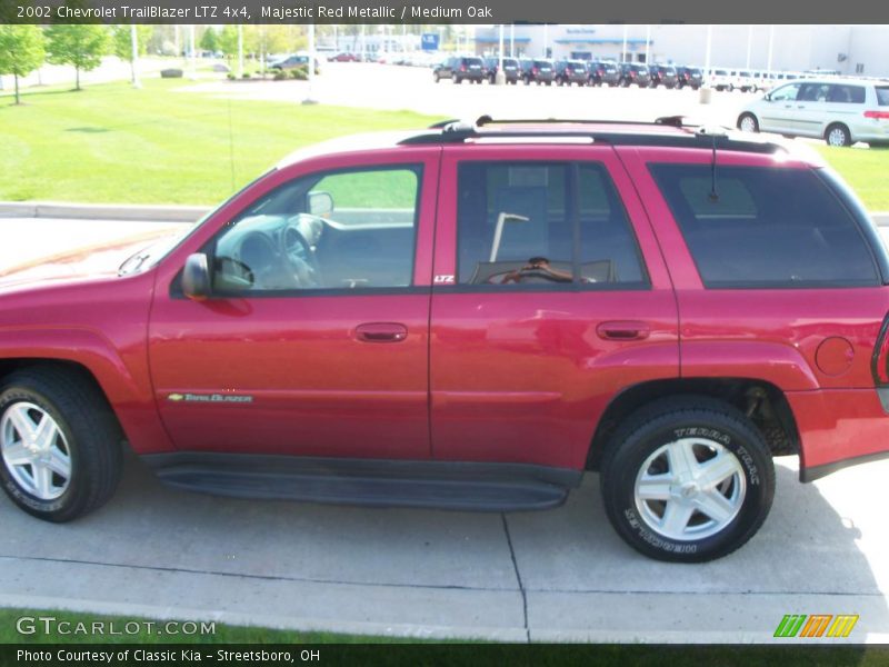 Majestic Red Metallic / Medium Oak 2002 Chevrolet TrailBlazer LTZ 4x4