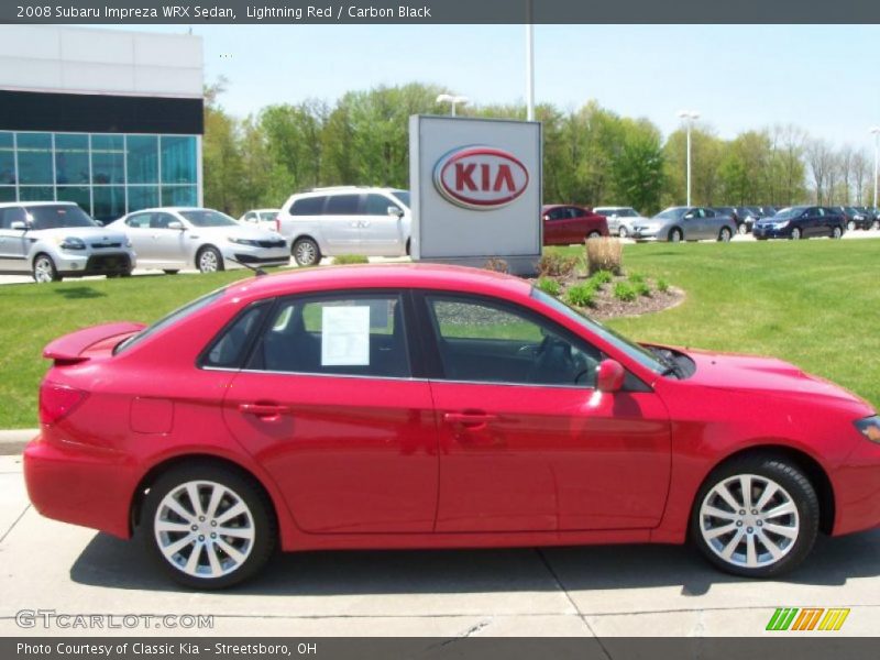 Lightning Red / Carbon Black 2008 Subaru Impreza WRX Sedan