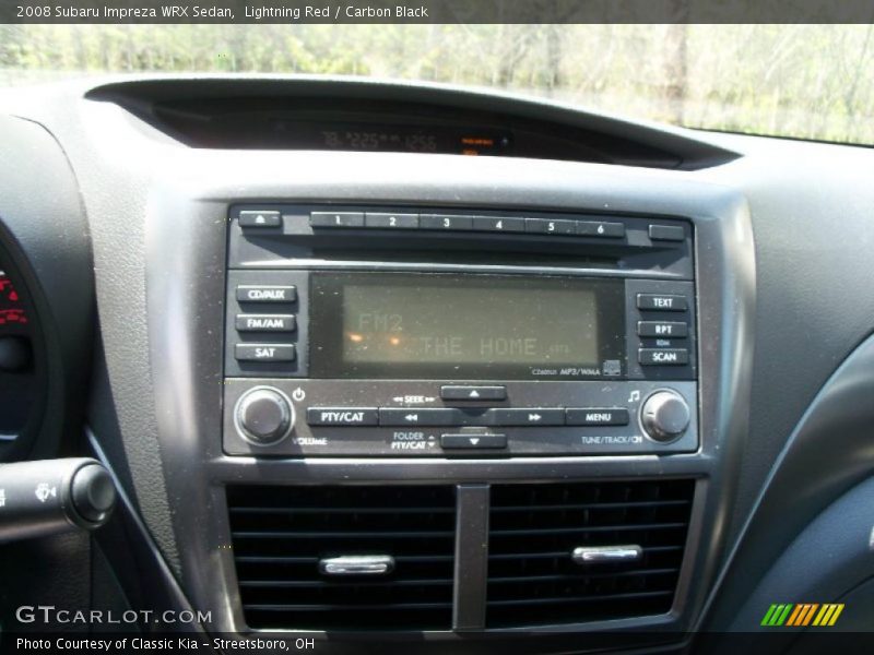 Lightning Red / Carbon Black 2008 Subaru Impreza WRX Sedan