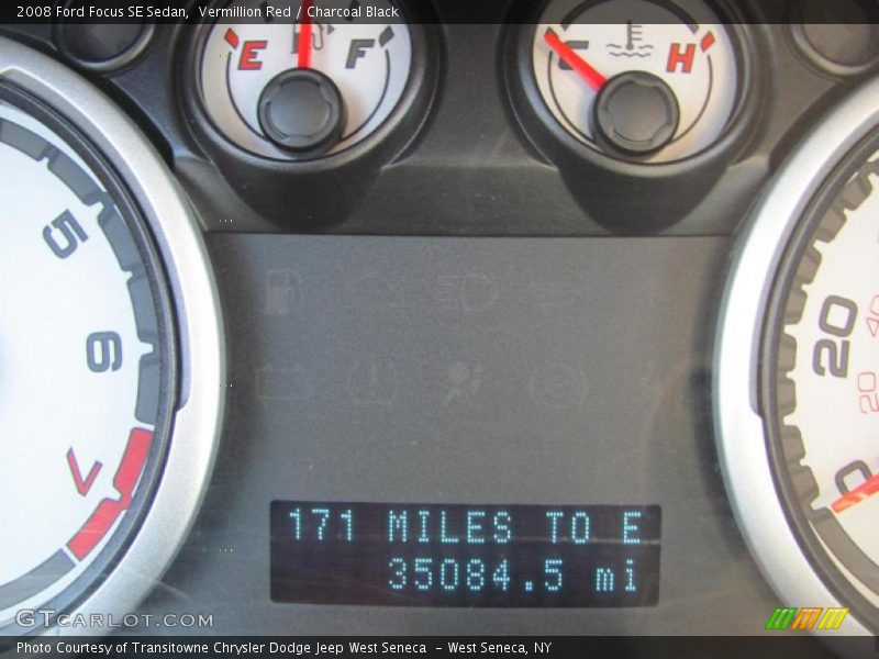 Vermillion Red / Charcoal Black 2008 Ford Focus SE Sedan