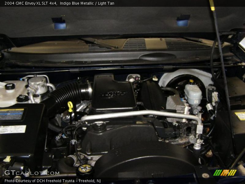 Indigo Blue Metallic / Light Tan 2004 GMC Envoy XL SLT 4x4