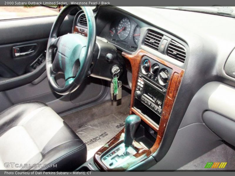 Winestone Pearl / Black 2000 Subaru Outback Limited Sedan