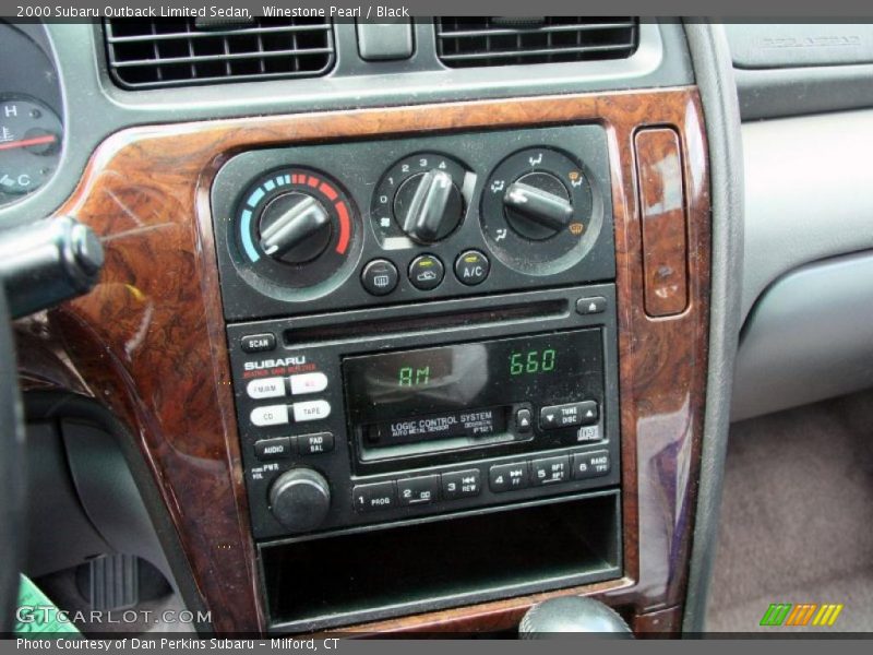 Winestone Pearl / Black 2000 Subaru Outback Limited Sedan