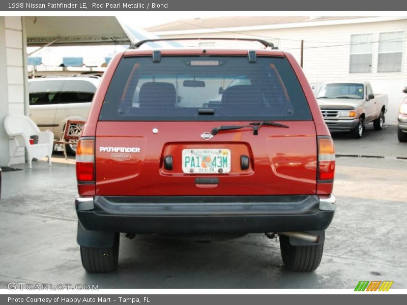 Red Pearl Metallic / Blond 1998 Nissan Pathfinder LE