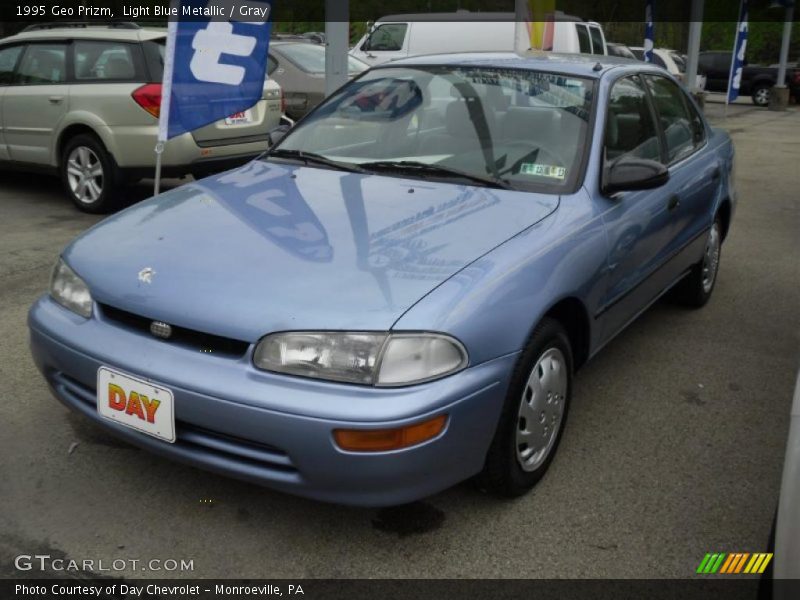 Light Blue Metallic / Gray 1995 Geo Prizm