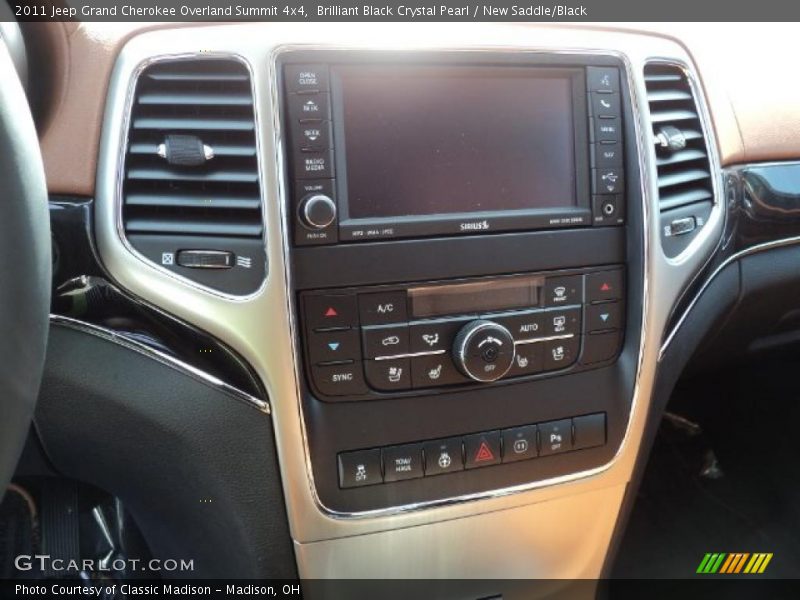 Brilliant Black Crystal Pearl / New Saddle/Black 2011 Jeep Grand Cherokee Overland Summit 4x4