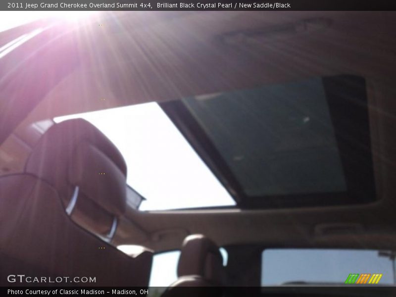 Brilliant Black Crystal Pearl / New Saddle/Black 2011 Jeep Grand Cherokee Overland Summit 4x4