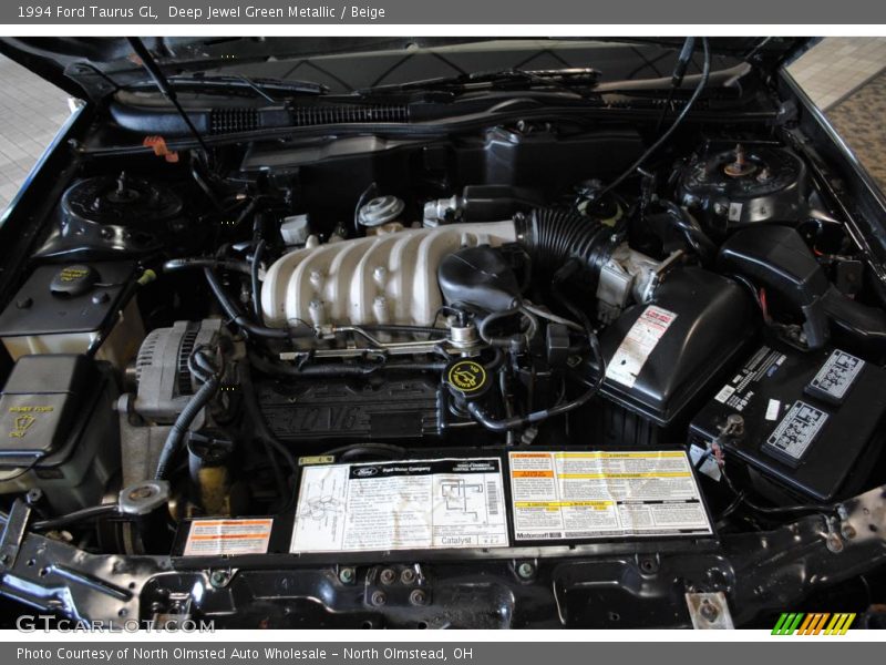 Deep Jewel Green Metallic / Beige 1994 Ford Taurus GL
