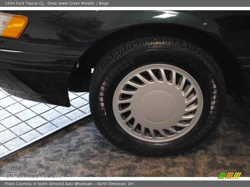 Deep Jewel Green Metallic / Beige 1994 Ford Taurus GL