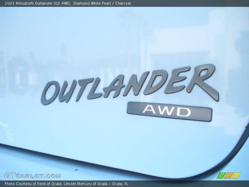  2003 Outlander XLS 4WD Logo