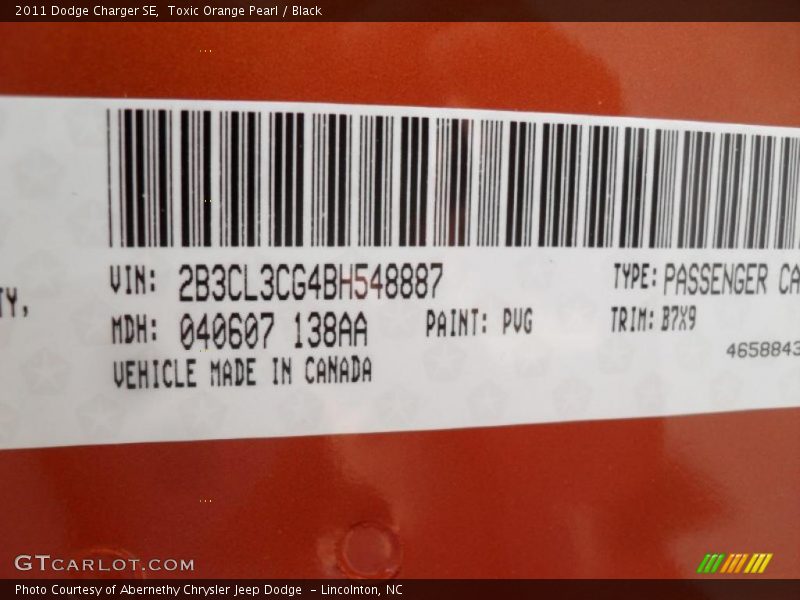 Toxic Orange Pearl / Black 2011 Dodge Charger SE