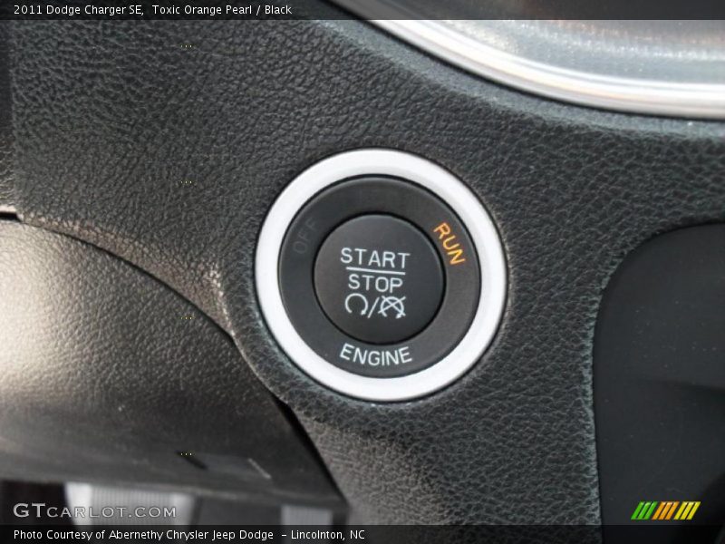 Toxic Orange Pearl / Black 2011 Dodge Charger SE