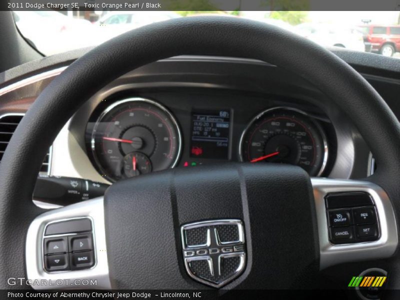 Toxic Orange Pearl / Black 2011 Dodge Charger SE