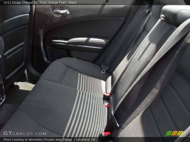 Toxic Orange Pearl / Black 2011 Dodge Charger SE