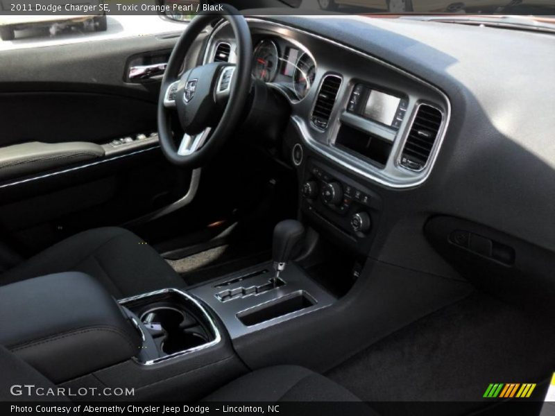 Toxic Orange Pearl / Black 2011 Dodge Charger SE