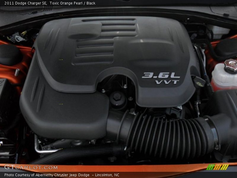 Toxic Orange Pearl / Black 2011 Dodge Charger SE