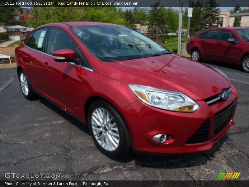 Red Candy Metallic / Charcoal Black Leather 2012 Ford Focus SEL Sedan