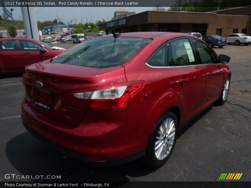 Red Candy Metallic / Charcoal Black Leather 2012 Ford Focus SEL Sedan
