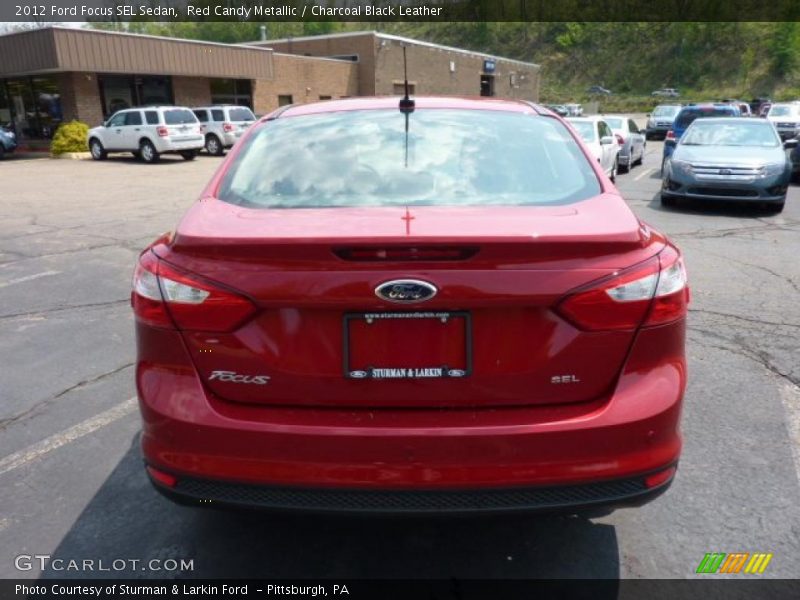 Red Candy Metallic / Charcoal Black Leather 2012 Ford Focus SEL Sedan