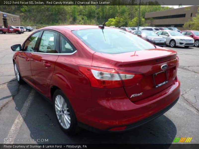 Red Candy Metallic / Charcoal Black Leather 2012 Ford Focus SEL Sedan