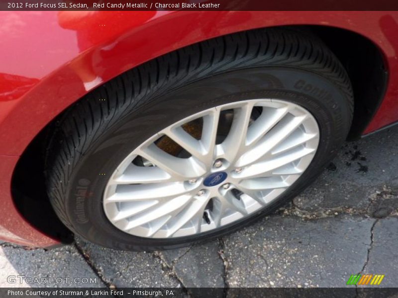 Red Candy Metallic / Charcoal Black Leather 2012 Ford Focus SEL Sedan