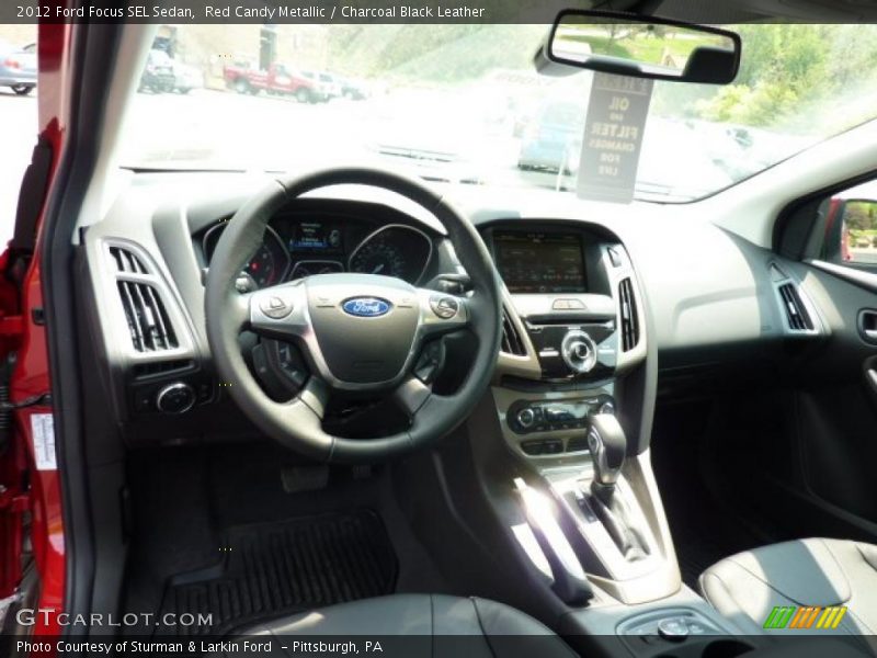 Red Candy Metallic / Charcoal Black Leather 2012 Ford Focus SEL Sedan