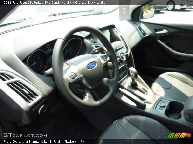 Red Candy Metallic / Charcoal Black Leather 2012 Ford Focus SEL Sedan