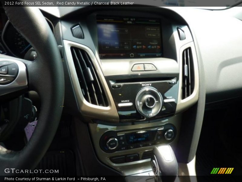 Red Candy Metallic / Charcoal Black Leather 2012 Ford Focus SEL Sedan