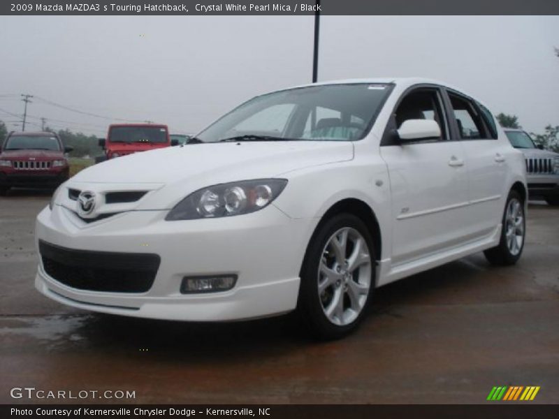 Front 3/4 View of 2009 MAZDA3 s Touring Hatchback