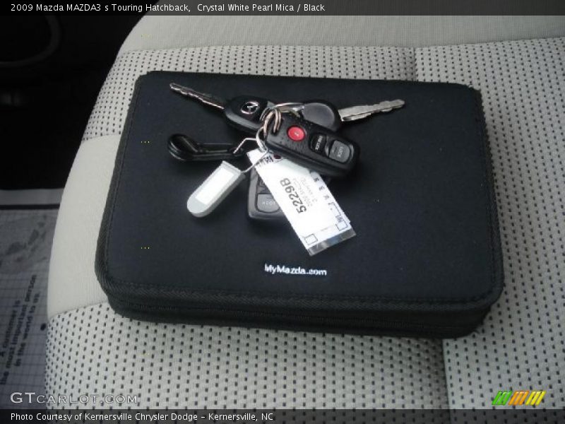 Crystal White Pearl Mica / Black 2009 Mazda MAZDA3 s Touring Hatchback