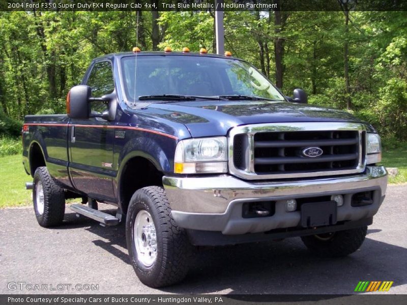 Front 3/4 View of 2004 F350 Super Duty FX4 Regular Cab 4x4